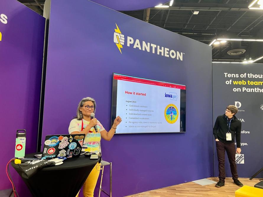 A photograph featuring Nikki Flores from Lullabot and Pantheon's Steve Persch at the Pantheon DrupalCon 2024 booth. 