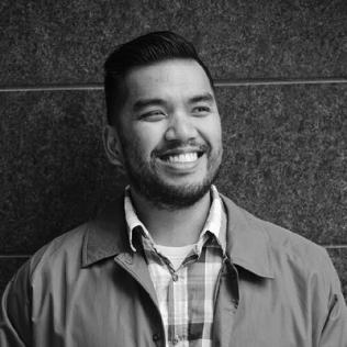 Black and white image of Joe smiling