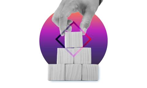 A graphic of building blocks against the purple background symbolizing headless CMS.