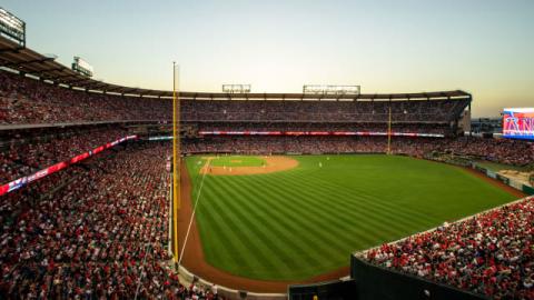 An evening view of the baseball field and stadium stands inside Angel Stadium.